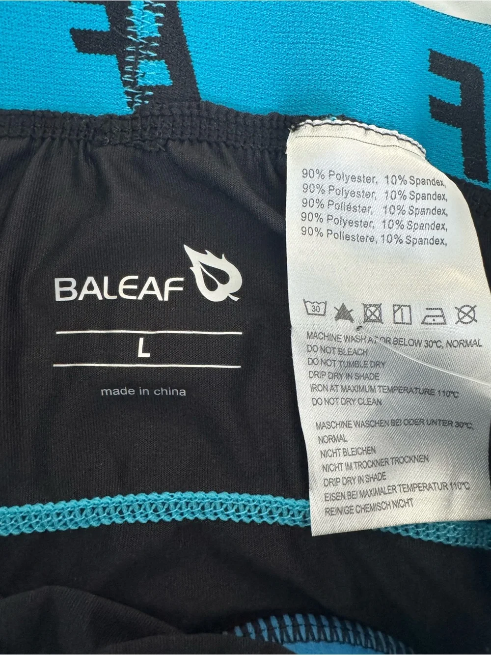 Baleaf Men’s Black Athletic Shorts with Teal Trim